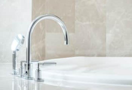 Clean rust stains from bathtub